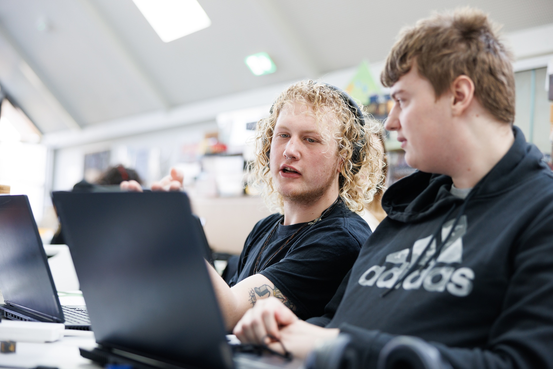 Male students, working together on computer, Daphne Oram, Canterbury